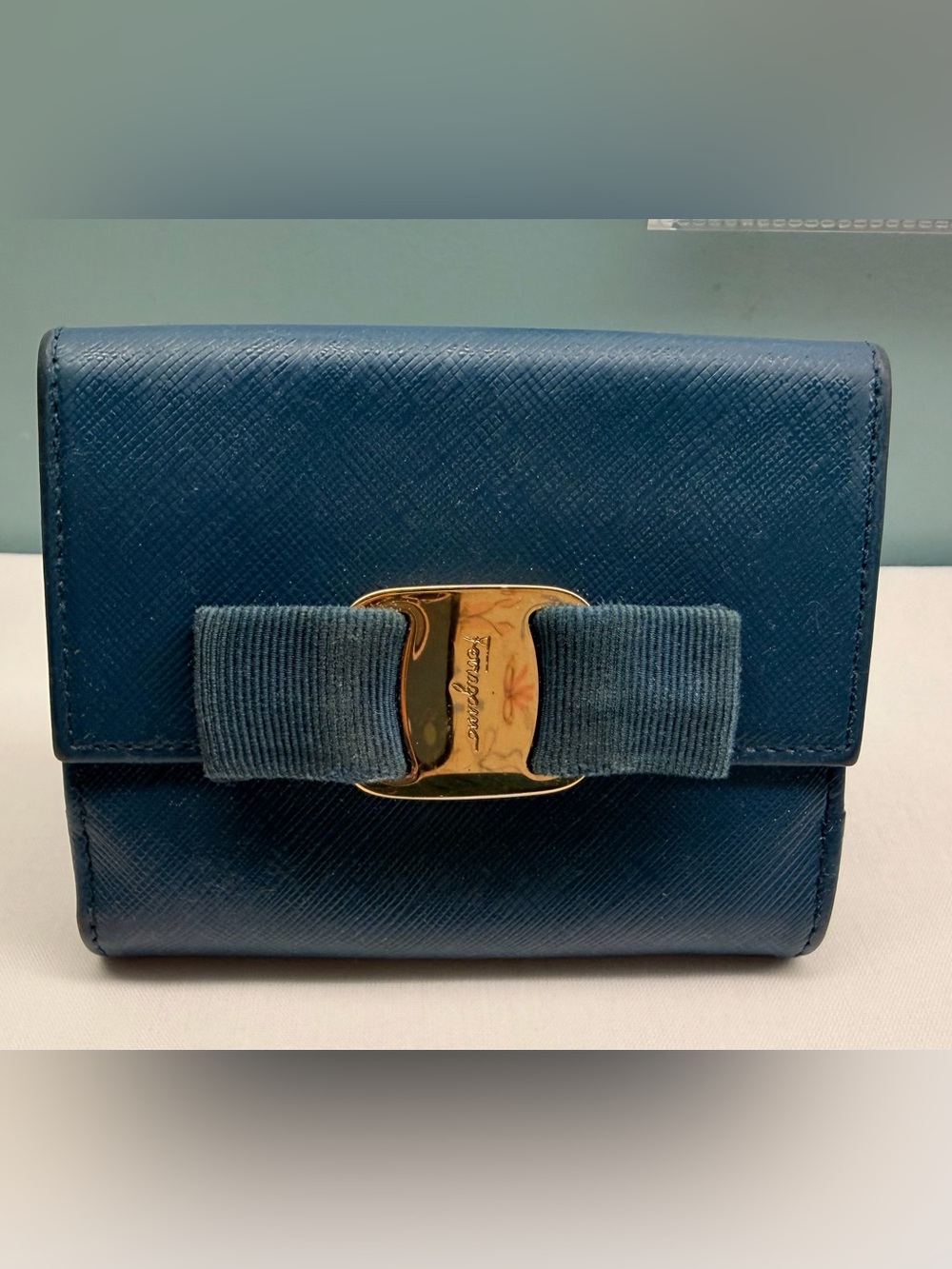 Salvatore Ferragamo Teal Leather Bow Wallet with Gold Hardware
